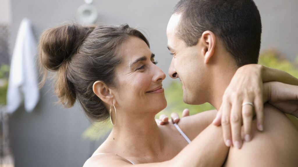 Couple hugging.